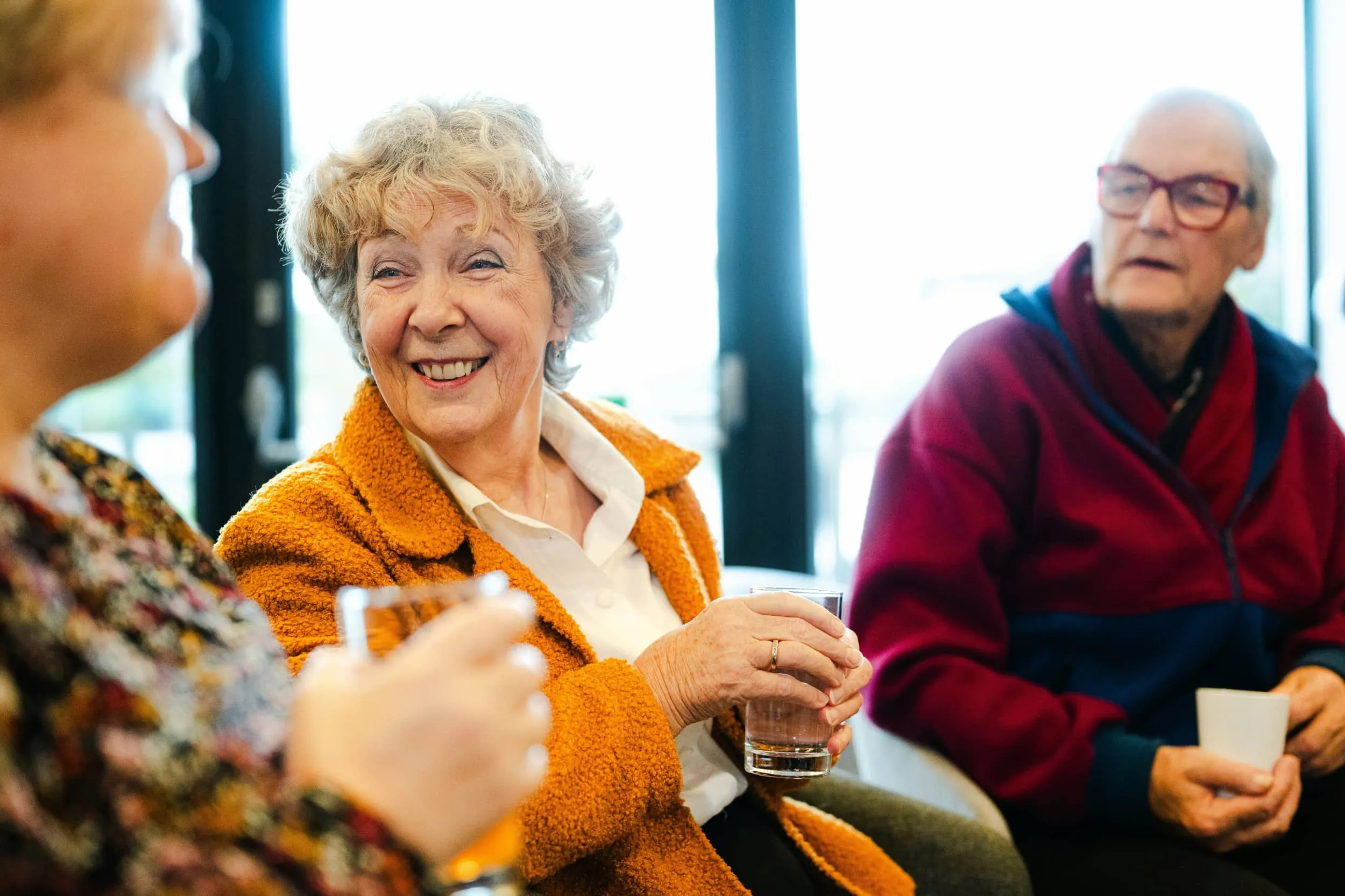 Residents enjoying social hour together